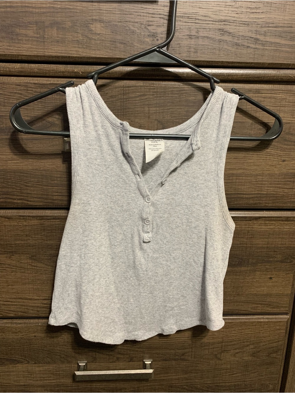 Grey tank with buttons